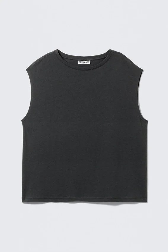 Camiseta sin mangas oversize – Oscura Camiseta sin mangas oversize – Oscura