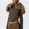 Chaleco bomber con capucha convertible – Gris oscuro Chaleco bomber con capucha convertible – Gris oscuro