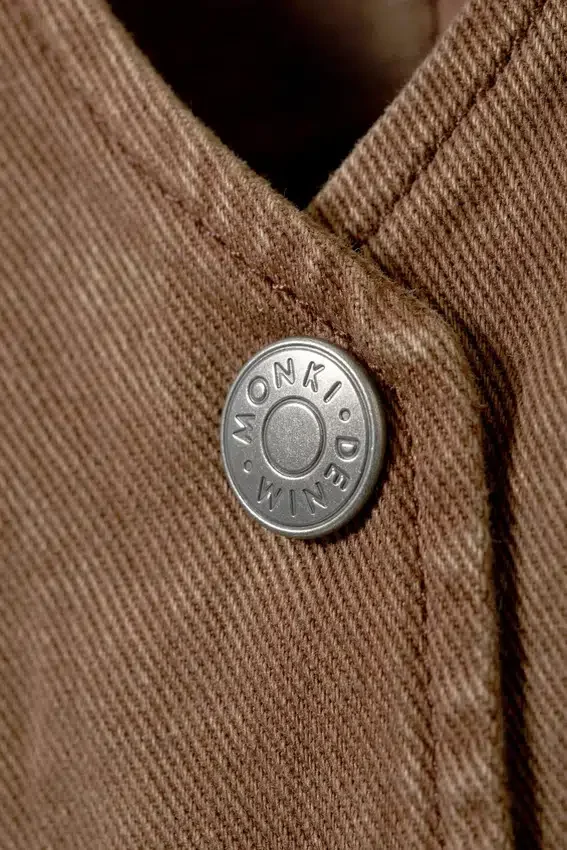 Chaleco de denim sin mangas con cordones – Marrón oscuro lavado Chaleco de denim sin mangas con cordones – Marrón oscuro lavado