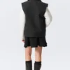 Chaleco de lona con cremallera y ligero acolchado – Negro Chaleco de lona con cremallera y ligero acolchado – Negro