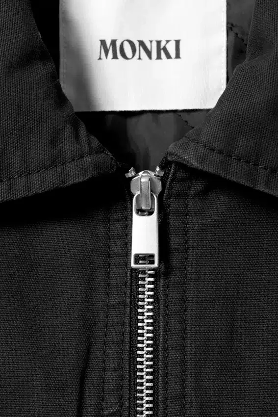Chaleco de lona con cremallera y ligero acolchado – Negro Chaleco de lona con cremallera y ligero acolchado – Negro