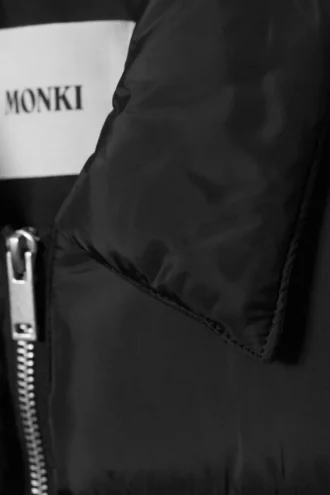 Chaqueta acolchada con cuello – Negro
