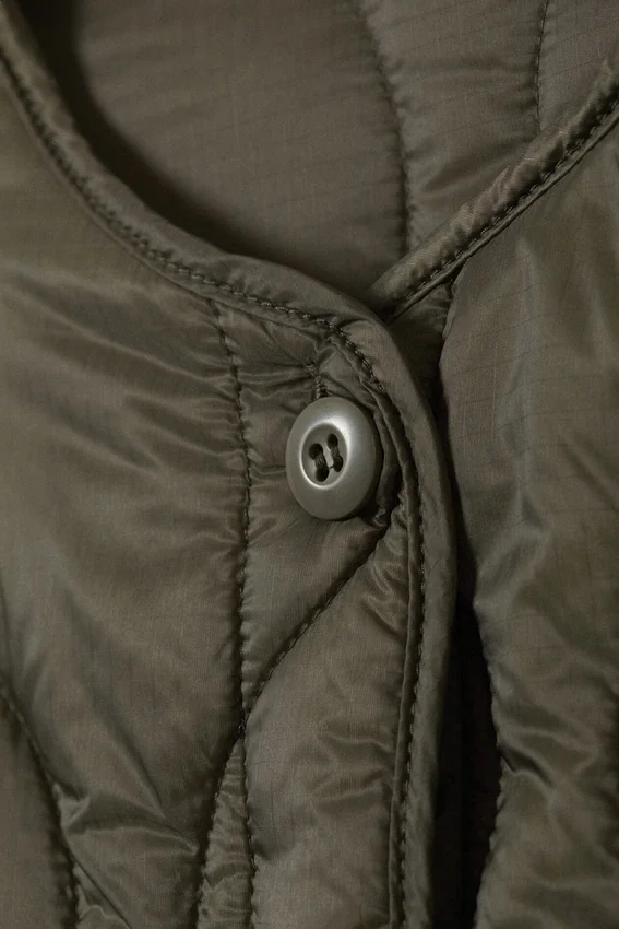 Chaqueta acolchada oversize con forro – Verde caqui oscuro Chaqueta acolchada oversize con forro – Verde caqui oscuro