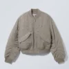 Chaqueta bomber corta con ojales – Dusty Mole Chaqueta bomber corta con ojales – Dusty Mole