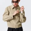 Chaqueta de algodón con cremallera de corte recto – Beige Chaqueta de algodón con cremallera de corte recto – Beige