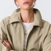 Chaqueta de algodón con cremallera de corte recto – Beige Chaqueta de algodón con cremallera de corte recto – Beige