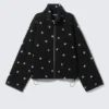 Chaqueta de cuello alto – Negro con lunares Chaqueta de cuello alto – Negro con lunares