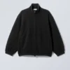 Chaqueta de forro polar con cremallera – Negro Chaqueta de forro polar con cremallera – Negro