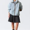 Chaqueta de forro polar de pelo largo – Azul claro – Forro marrón Chaqueta de forro polar de pelo largo – Azul claro – Forro marrón