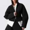 Chaqueta entallada con cremallera de neopreno – Negro Chaqueta entallada con cremallera de neopreno – Negro