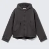 Chaqueta holgada de lona con capucha – Negro jaspeado Chaqueta holgada de lona con capucha – Negro jaspeado