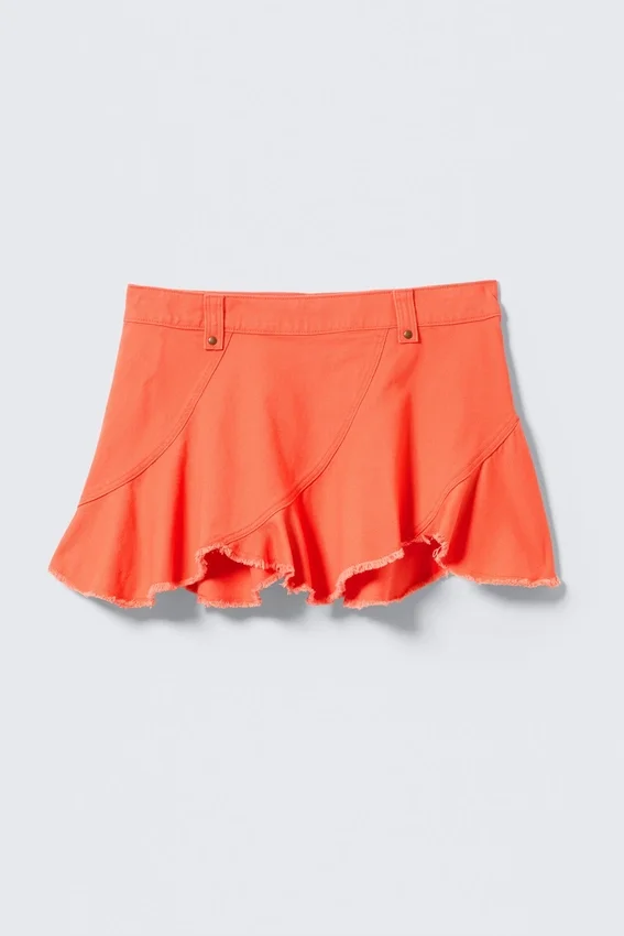 Falda asimétrica de sarga con flecos – Rojo claro Falda asimétrica de sarga con flecos – Rojo claro