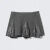 Falda con pliegues – Rayas grises Falda con pliegues – Rayas grises