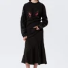 Falda midi de talle medio con costuras curvas – Negro