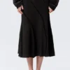Falda midi de talle medio con costuras curvas – Negro