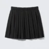 Falda midi plisada de talle bajo – Negro Falda midi plisada de talle bajo – Negro