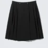 Falda midi plisada – Negro Falda midi plisada – Negro