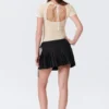 Falda mini cruzada plisada de talle bajo – Negro
