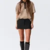 Falda mini de traje de talle bajo y corte ajustado – Negro