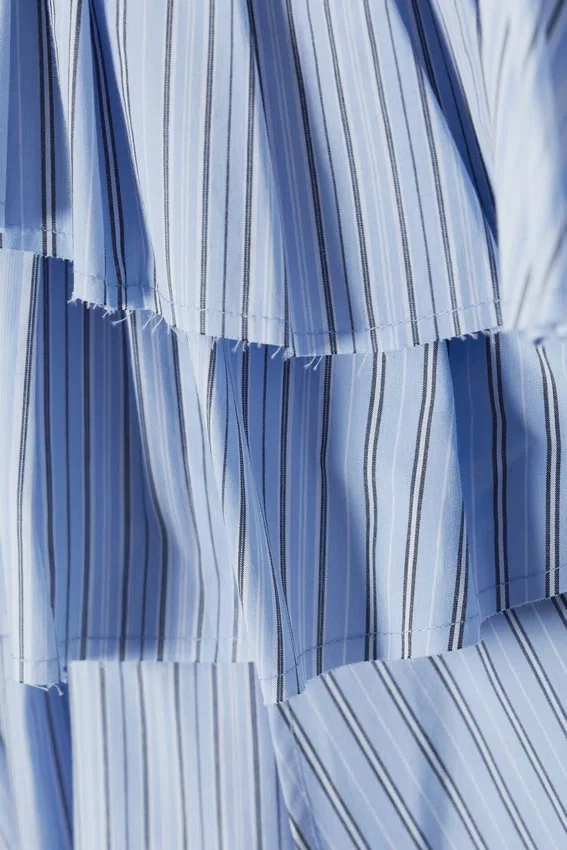 Falda plisada en capas – Rayas azul claro Falda plisada en capas – Rayas azul claro