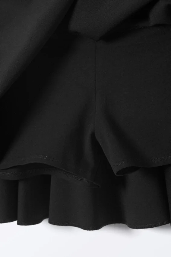 Faldita-pantalón acampanada de talle bajo – Negro Faldita-pantalón acampanada de talle bajo – Negro