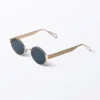 Gafas de sol ovaladas con montura metálica minimalista – Doradas – Lentes azul oscuro Gafas de sol ovaladas con montura metálica minimalista – Doradas – Lentes azul oscuro