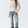 Jersey de cuello alto ajustado – Rosa claro – The Garden Jersey de cuello alto ajustado – Rosa claro – The Garden