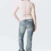Jersey de cuello alto ajustado – Rosa claro – The Garden Jersey de cuello alto ajustado – Rosa claro – The Garden