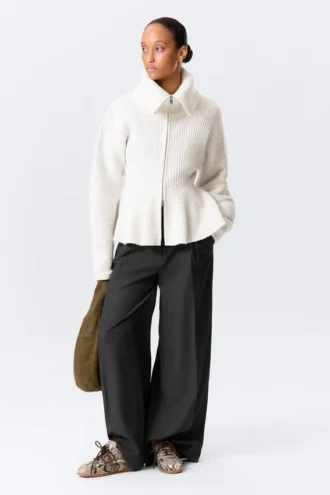 Jerséu con cremallera y peplum de punto elástico – Blanco