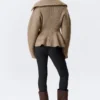 Jerséu con cremallera y peplum de punto elástico – Dusty Mole