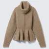 Jerséu con cremallera y peplum de punto elástico – Dusty Mole