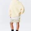Jerséu de cuello alto oversize de punto – Amarillo claro Jerséu de cuello alto oversize de punto – Amarillo claro