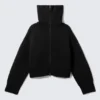 Jerséu de punto con cuello de embudo y doble cremallera – Negro Jerséu de punto con cuello de embudo y doble cremallera – Negro