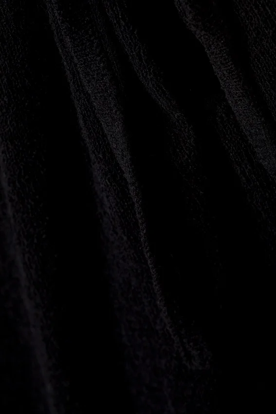 Jerséu de punto con hombros asimétricos atados – Negro Jerséu de punto con hombros asimétricos atados – Negro