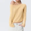 Jerséu de punto holgado con cuello barco – Amarillo claro Jerséu de punto holgado con cuello barco – Amarillo claro