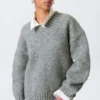 Jerséu de punto oversize con cuello en V – Gris jaspeado Jerséu de punto oversize con cuello en V – Gris jaspeado