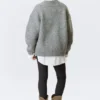 Jerséu de punto oversize con cuello en V – Gris jaspeado Jerséu de punto oversize con cuello en V – Gris jaspeado