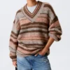 Jerséu de punto oversize con cuello en V – Rayas marrones y naranjas Jerséu de punto oversize con cuello en V – Rayas marrones y naranjas
