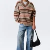 Jerséu de punto oversize con cuello en V – Rayas marrones y naranjas Jerséu de punto oversize con cuello en V – Rayas marrones y naranjas