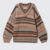 Jerséu de punto oversize con cuello en V – Rayas marrones y naranjas Jerséu de punto oversize con cuello en V – Rayas marrones y naranjas