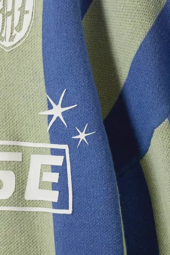 Jerséu holgado de punto con diseño de equipo de fútbol – Rayas verdes y azules Jerséu holgado de punto con diseño de equipo de fútbol – Rayas verdes y azules