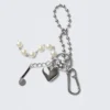 Llavero con varios colgantes – Metal/Perlas Llavero con varios colgantes – Metal/Perlas