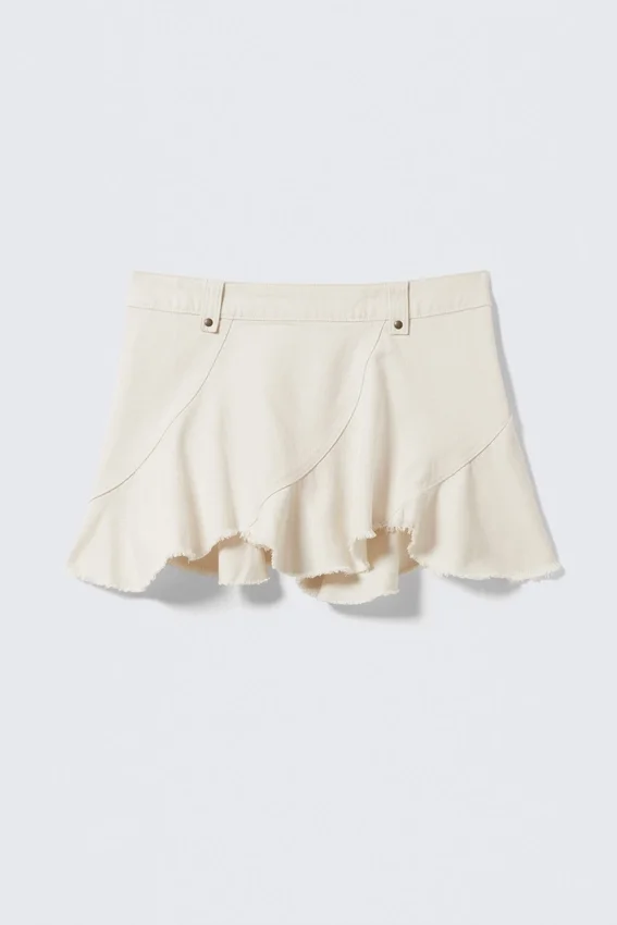 Mini falda asimétrica de sarga con flecos – Blanco roto Mini falda asimétrica de sarga con flecos – Blanco roto
