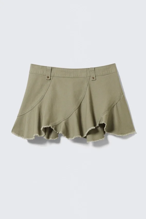 Mini falda asimétrica de sarga con flecos – Verde caqui Mini falda asimétrica de sarga con flecos – Verde caqui