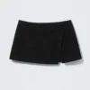 Mini falda cruzada de ante – Negro