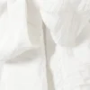 Mini falda cruzada de talle bajo con detalle de lazo – Blanco roto Mini falda cruzada de talle bajo con detalle de lazo – Blanco roto