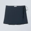 Mini falda cruzada entallada de viscosa – Azul oscuro Mini falda cruzada entallada de viscosa – Azul oscuro