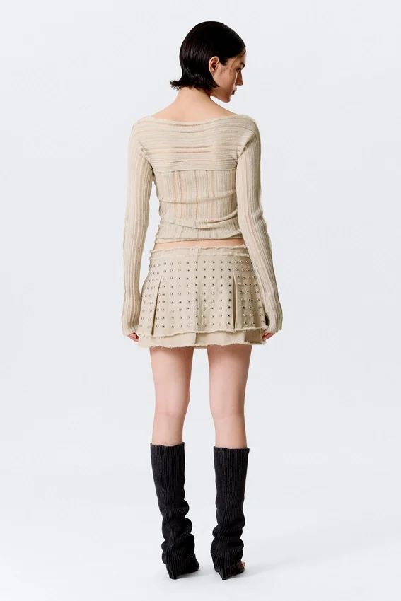 Minifalda plisada con tachuelas – Beige Minifalda plisada con tachuelas – Beige