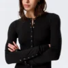 Minivestido de manga larga con botones a presión – Negro
