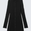 Minivestido de manga larga con botones a presión – Negro